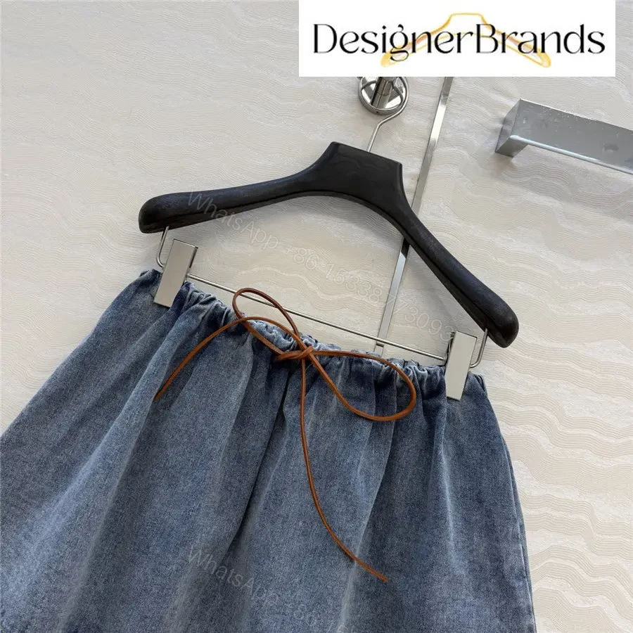 View 2 of Miu Miu Jewel-Blue Washed Denim Mini Skirt
