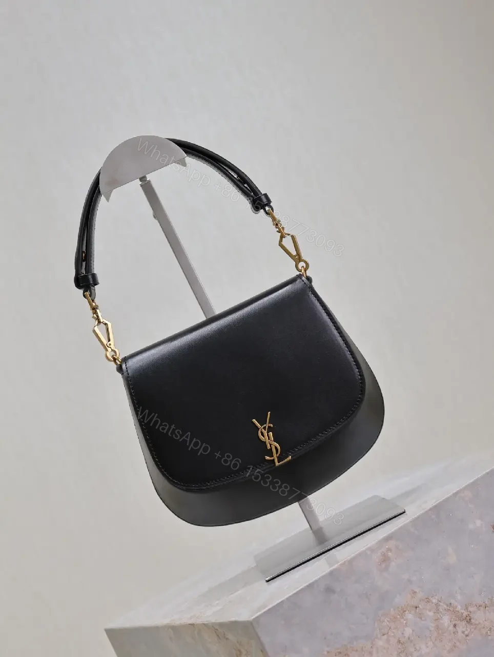 View 5 of Structured Leather Crossbody with Gold Emblem, Compact & Versatile Bag