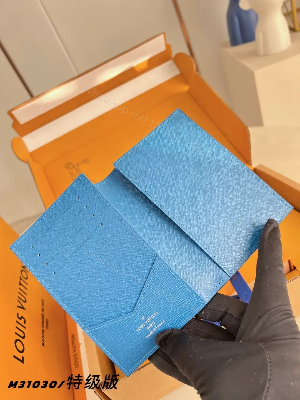 View 2 of Blue Monogram Leather Wallet: Compact Luxury, Secure Card Slots
