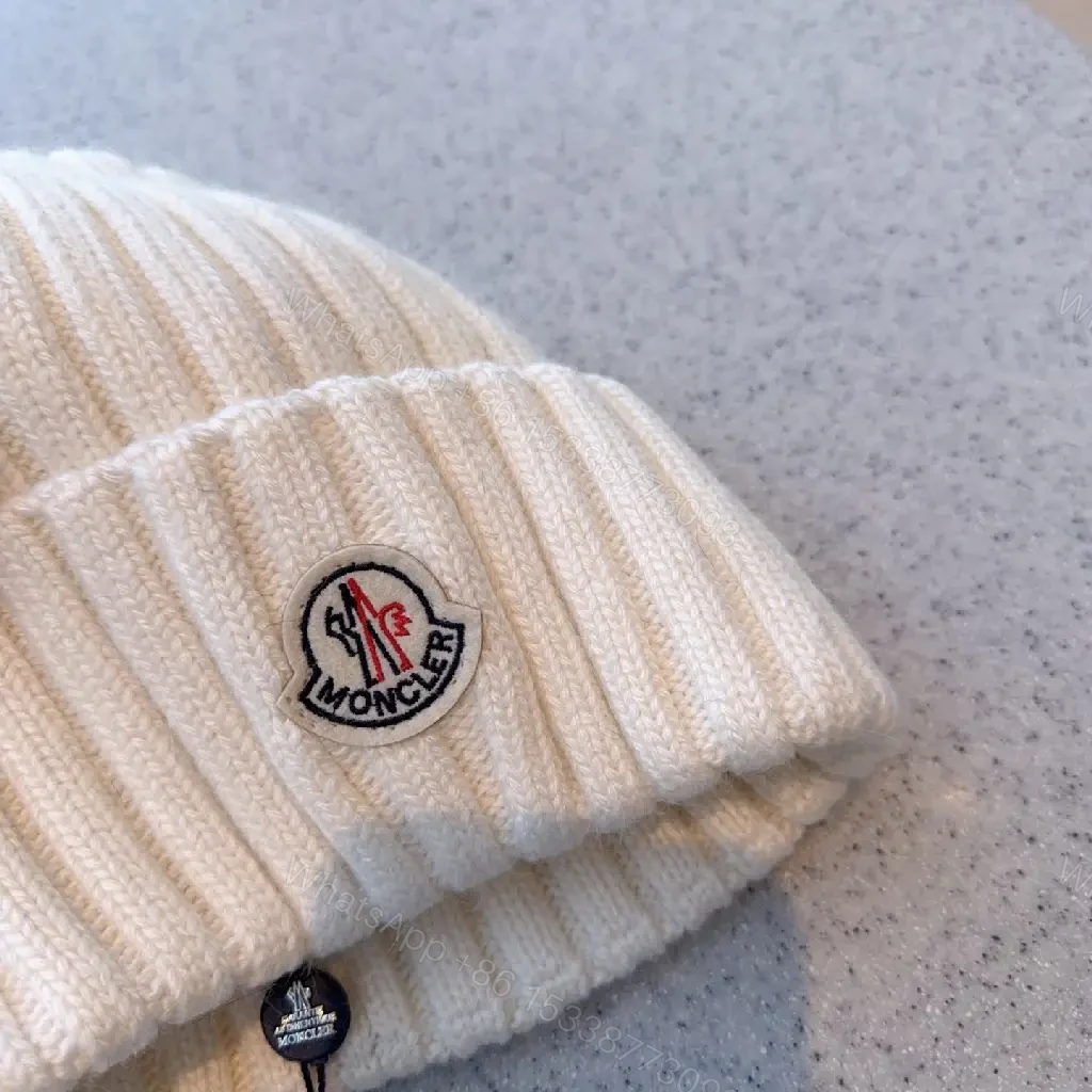 View 4 of Cozy Knit Beanie: Soft Ribbed Warmth, Subtle Emblem, Luxury Style
