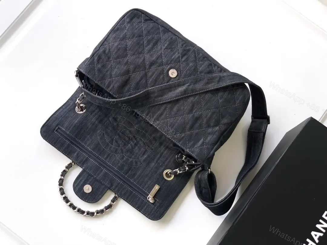 View 5 of Denim Quilted Flap Bag with Signature Chain Closure