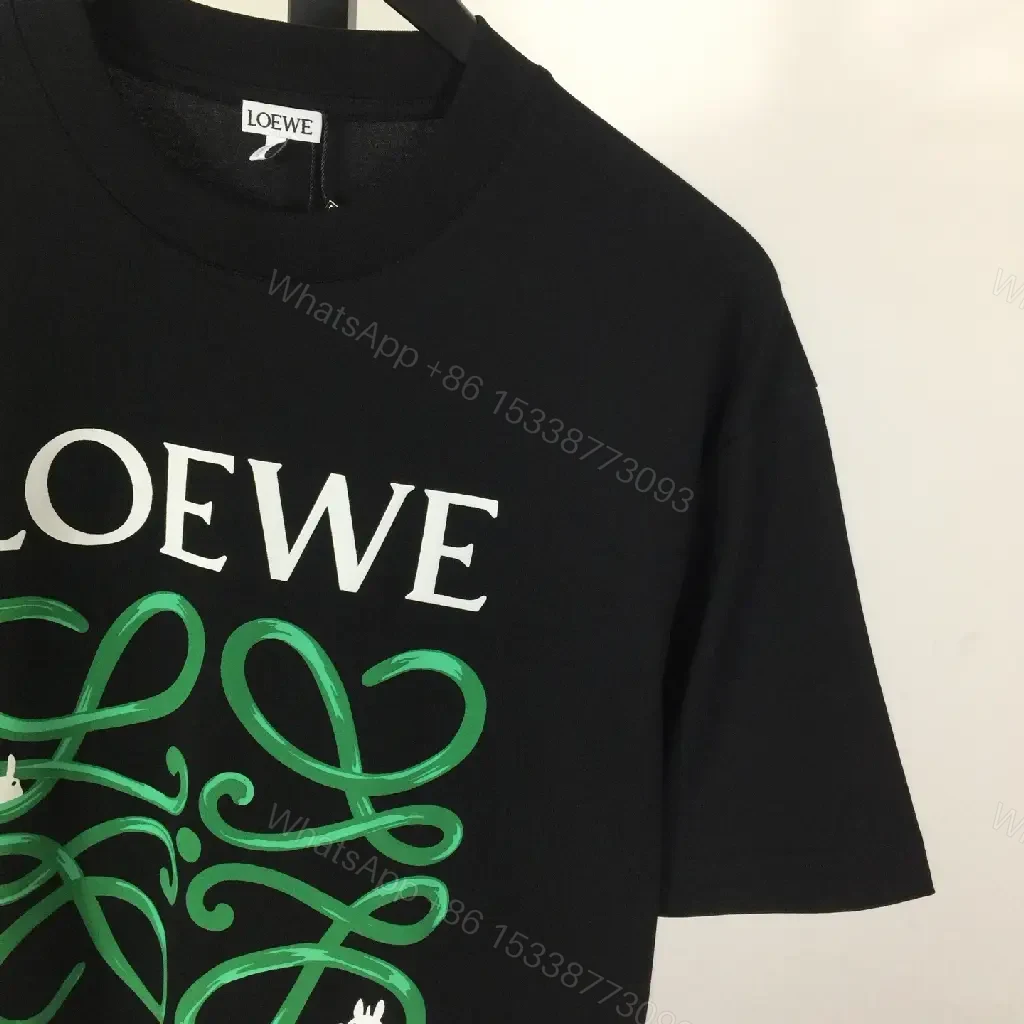 View 4 of Bold Graphic Tee with Luxe Charms + Monogram Logo Tee