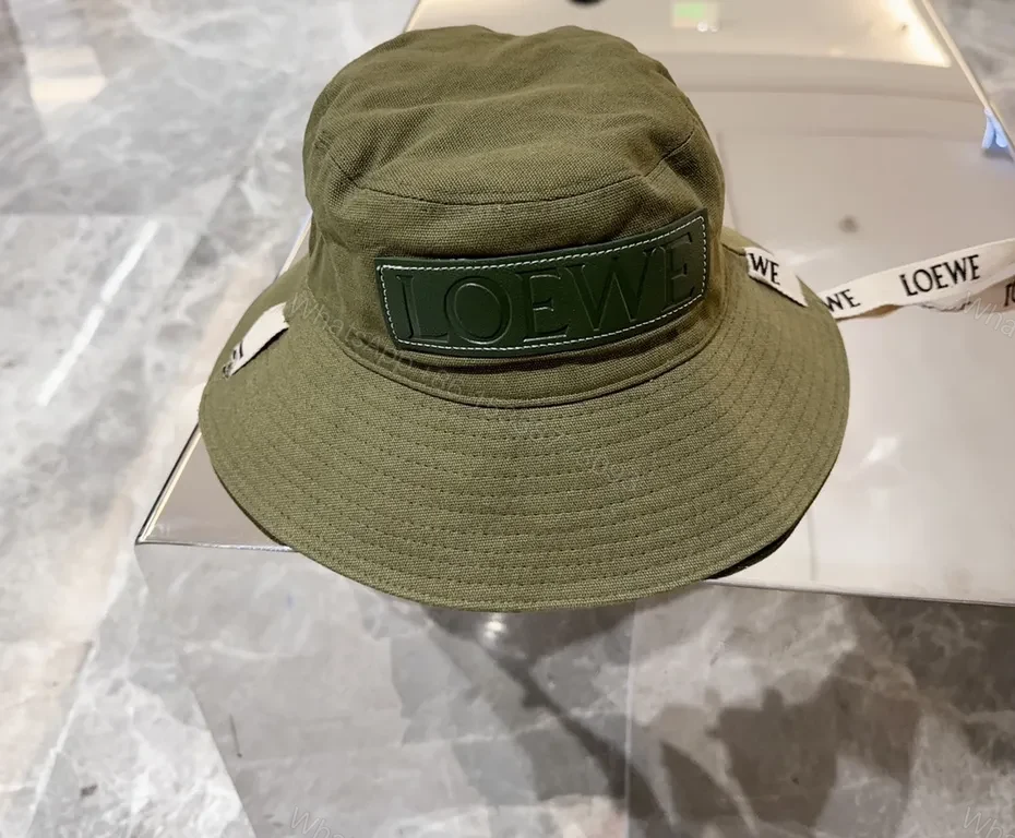 View 4 of Olive Canvas Bucket Hat: Subtle Luxury, LOEWE Patch