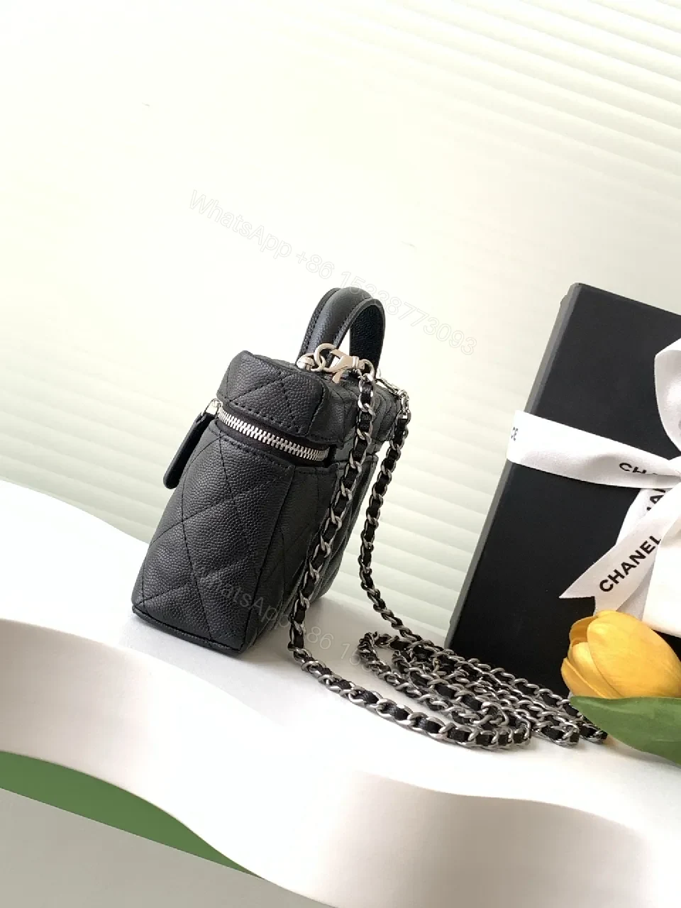 View 8 of Quilted Black Calf Leather Compact Handbag - Chic Versatile Luxury