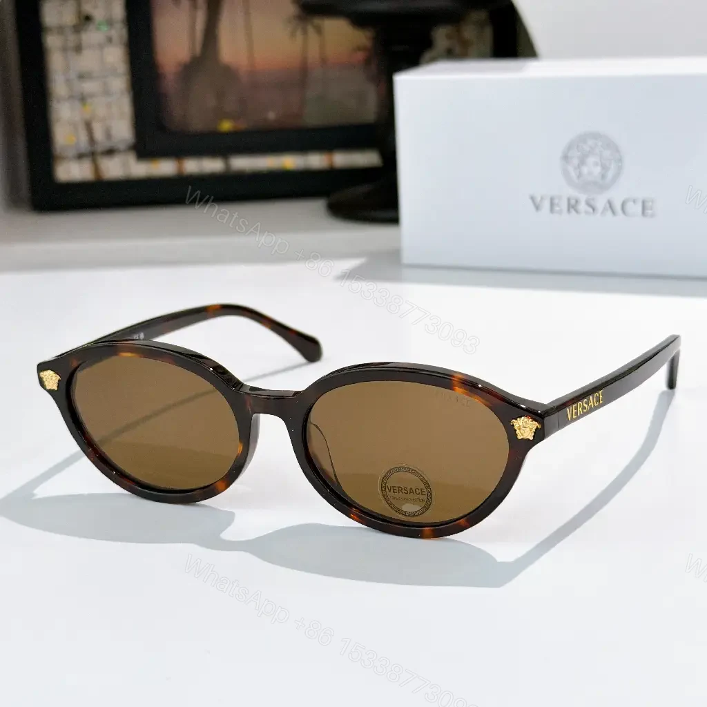 View 5 of Tortoiseshell Round-Frame Sunglasses with Gold Crest Accents