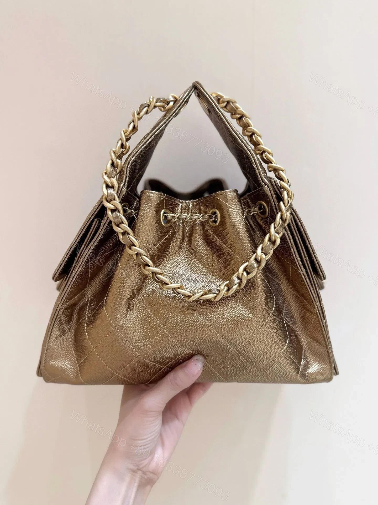 View 2 of CHANEL 25 HANDBAG 30 IN GOLDEN BROWN WITH GOLD HARDWARE