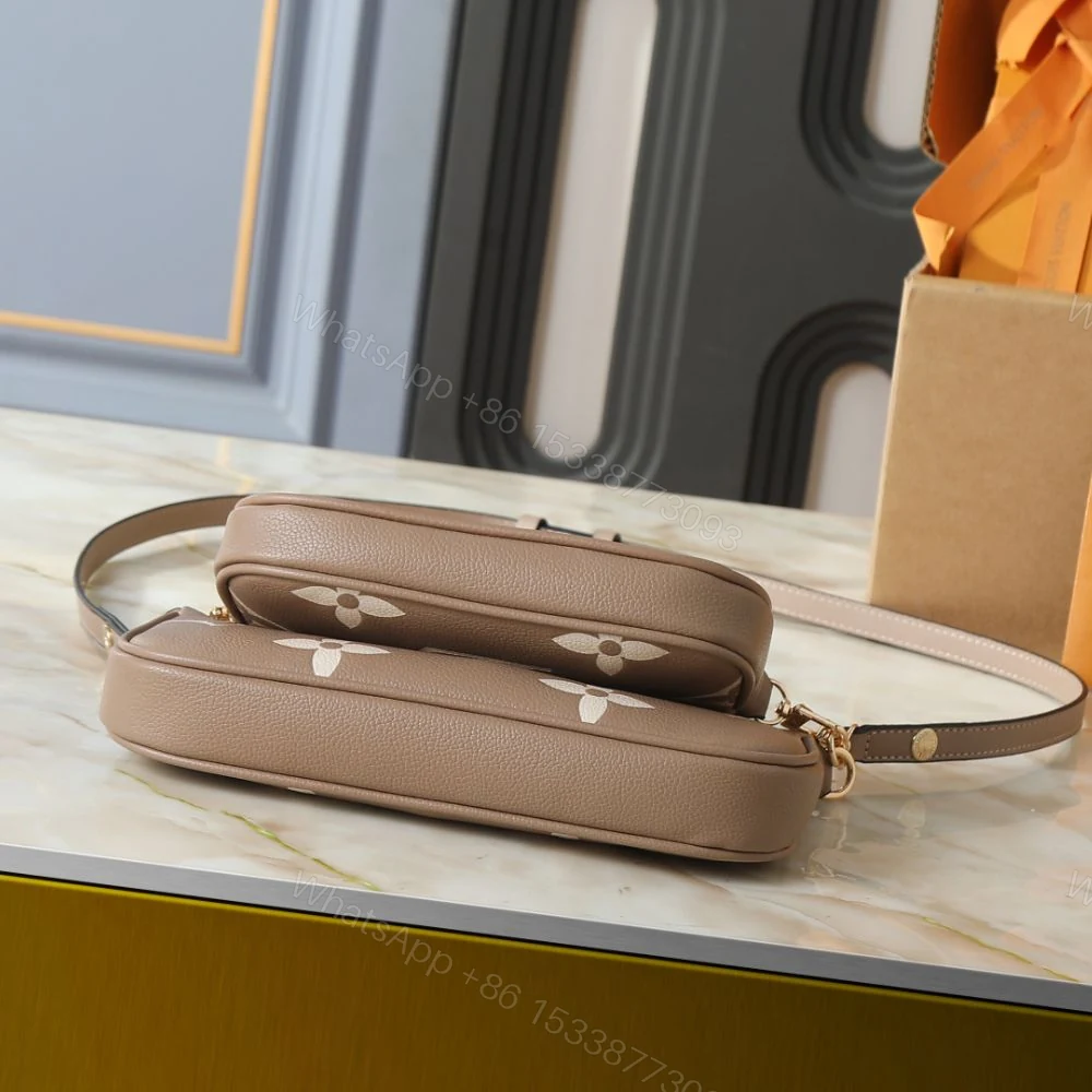 View 4 of Louis Vuitton Multi Pochette Accessoires Monogram Empreinte Greige 25Cm