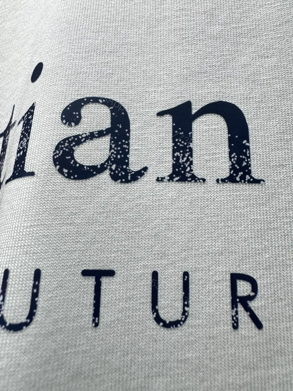 View 8 of White Cotton Crewneck Tee - Subtle Designer Crest, Everyday Luxury