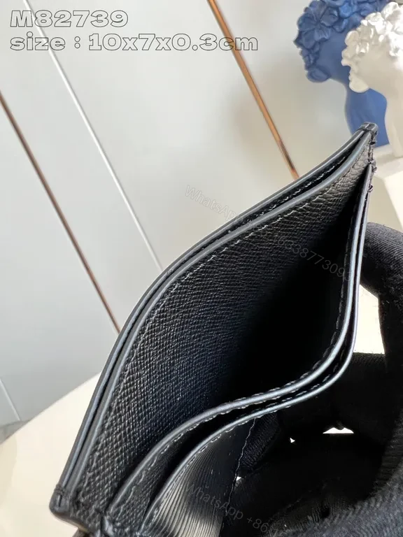 View 6 of Compact Black Textured Wallet with LV-Style Logo Details