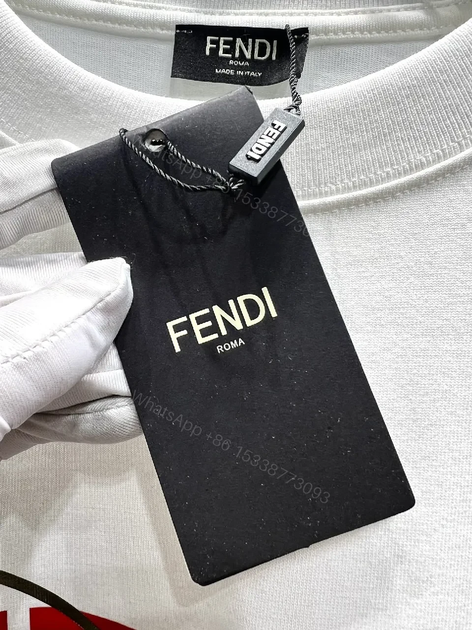View 3 of White Cotton Tee: Bold Fendi Logo, Minimalist Luxe Crewneck