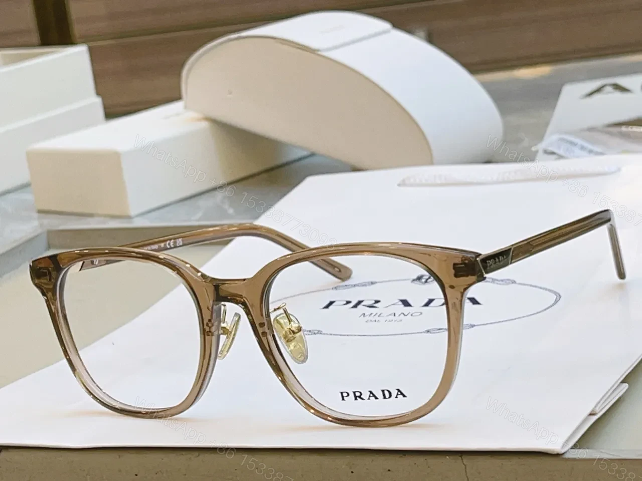 Chic Transparent-Frame Eyewear with Caramel Accents (60) — view 1