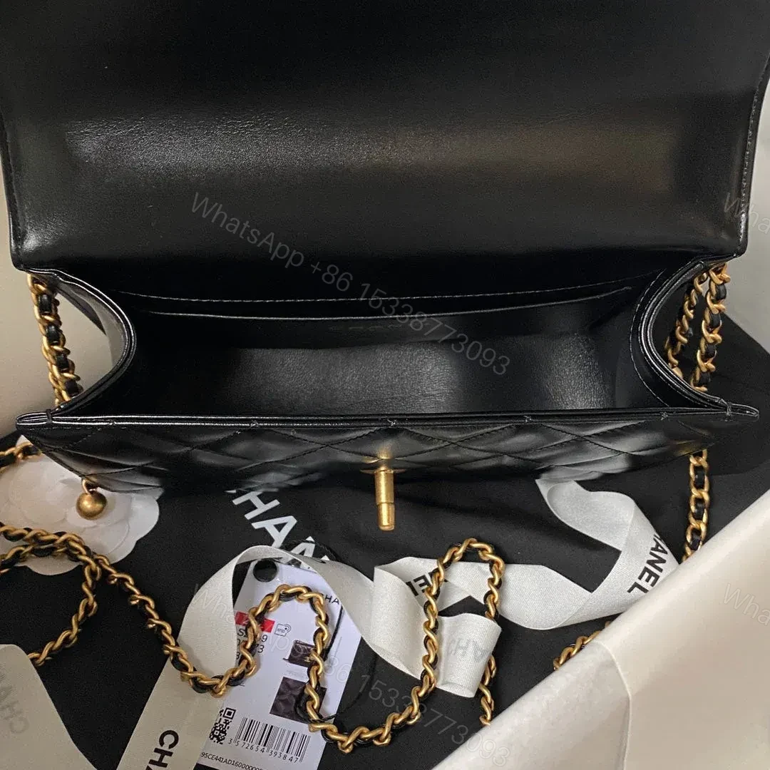 View 7 of CHANEL FLAP BAG 22 IN BLACK CALFSKIN WITH DOUBLE GOLD BALL