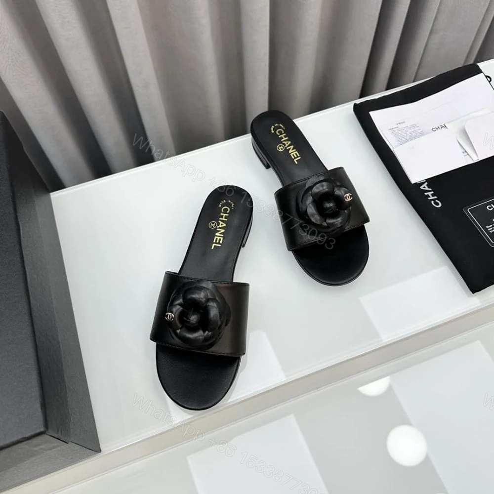 View 4 of Chanel Black Camellia Slide Flat Sandals
