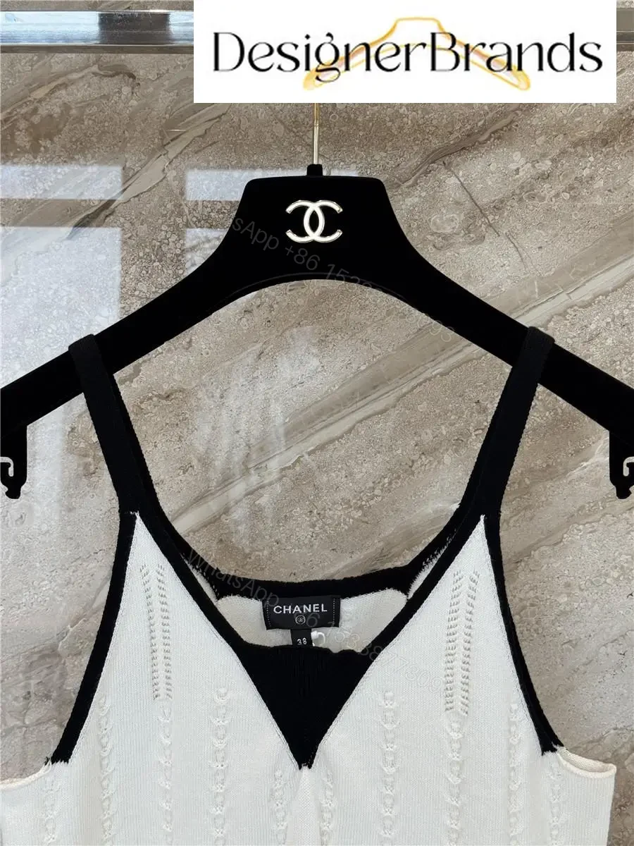 View 2 of White Knit Tank: Black Trim, Vertical Rib, Sleek Silhouette, Sleeveless Top