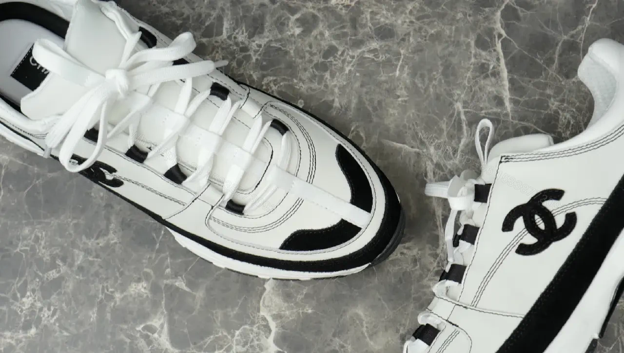 View 7 of White Leather Chunky Sneaker with Chanel Logo Details