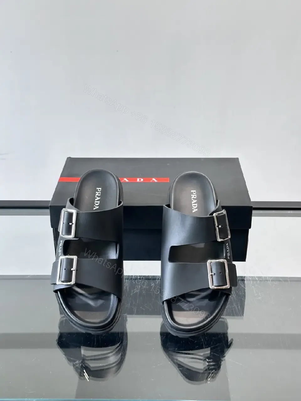 View 8 of Black Leather Double-Buckle Sandals — Prada Style Sliders