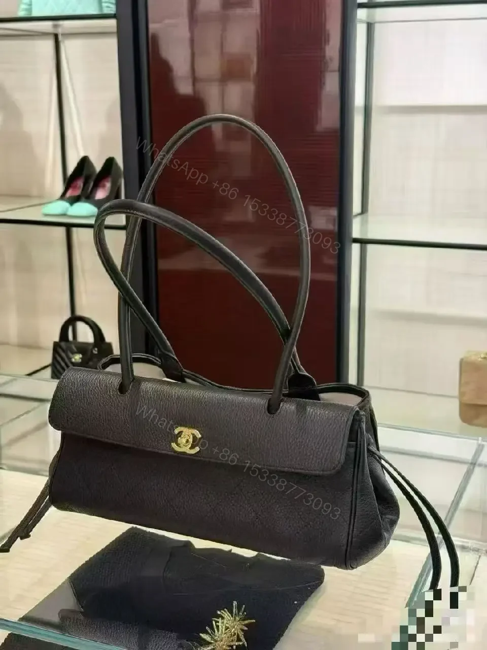 View 5 of Quilted Black Leather Handbag with Gold Hardware Luxury