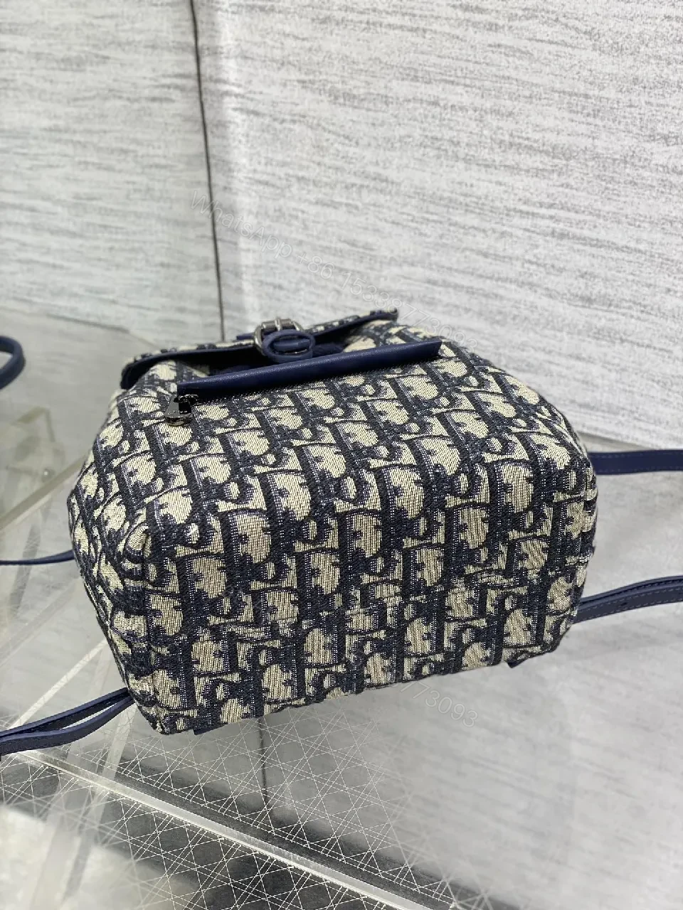 View 9 of Navy Canvas Monogram Compact Backpack with Leather Accents