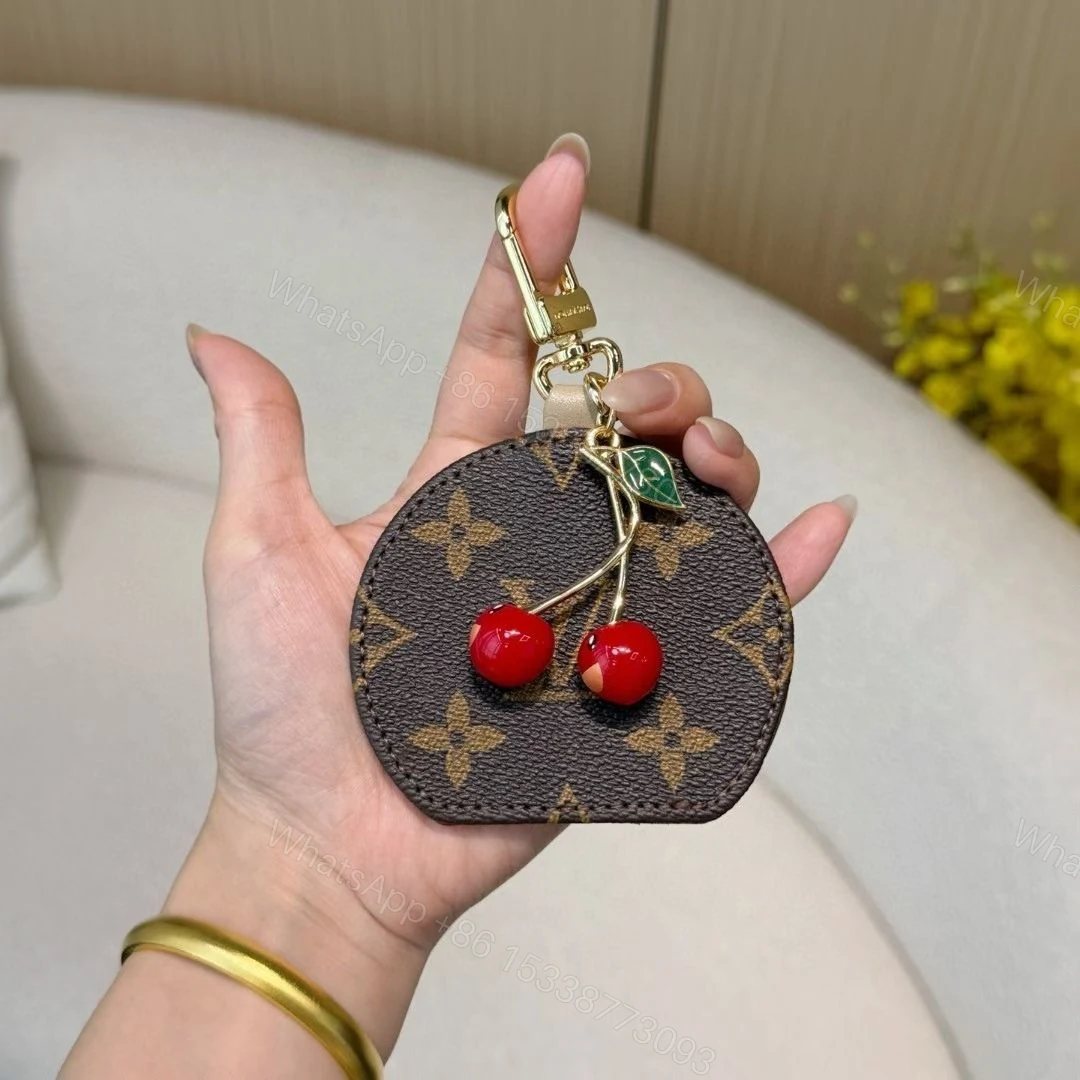 View 3 of Louis Vuitton Cerise And Blooming Flowers Bag Charms