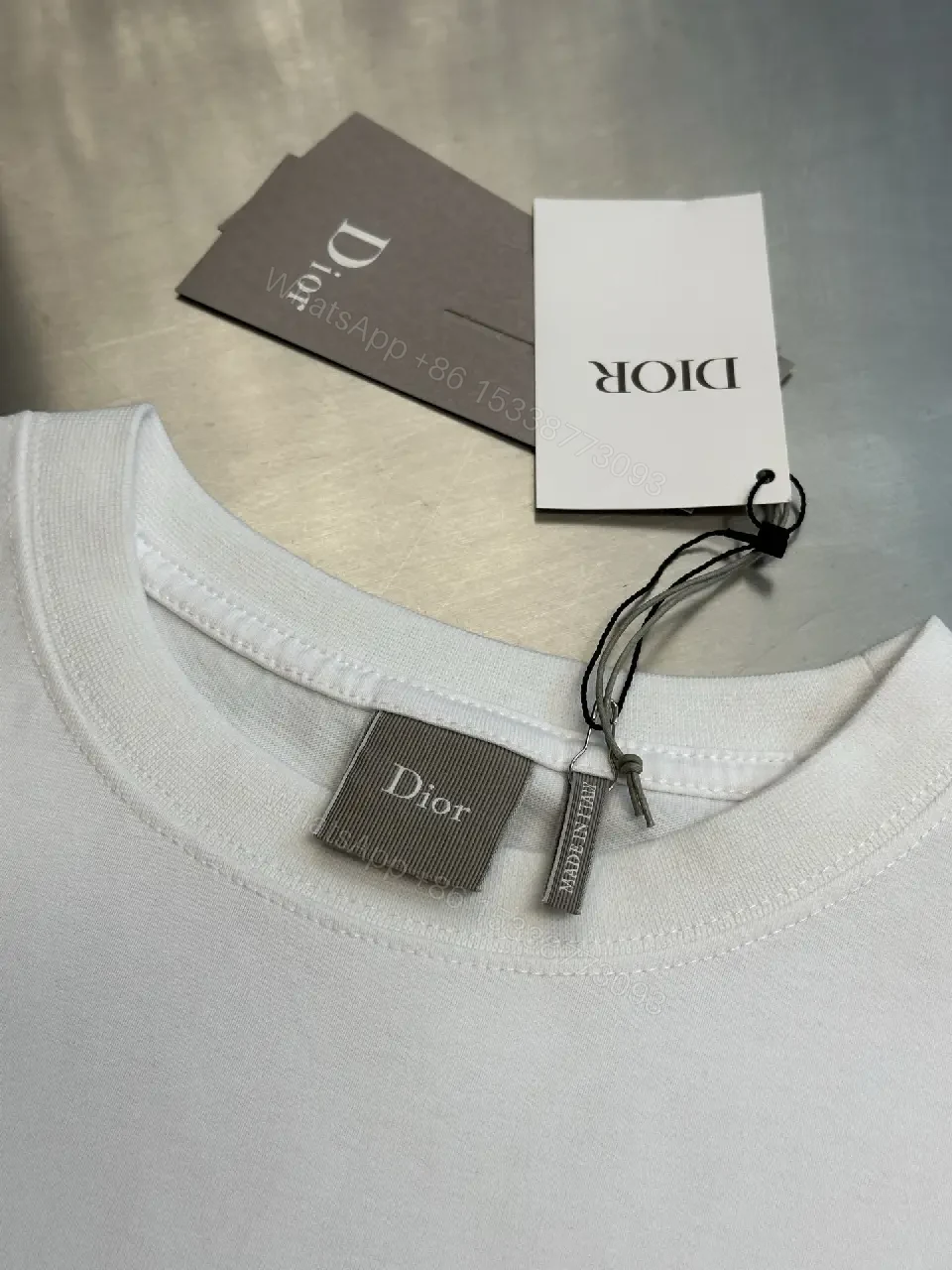 View 4 of Off-White Cotton Tee with Front Pocket, Relaxed Fit