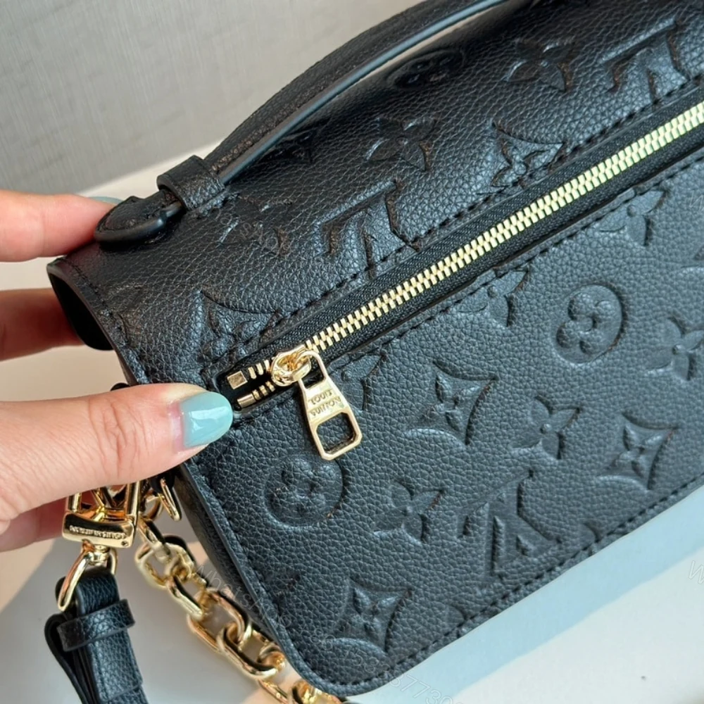 View 4 of Louis Vuitton Pochette Métis East West Bag Black 21Cm M46595