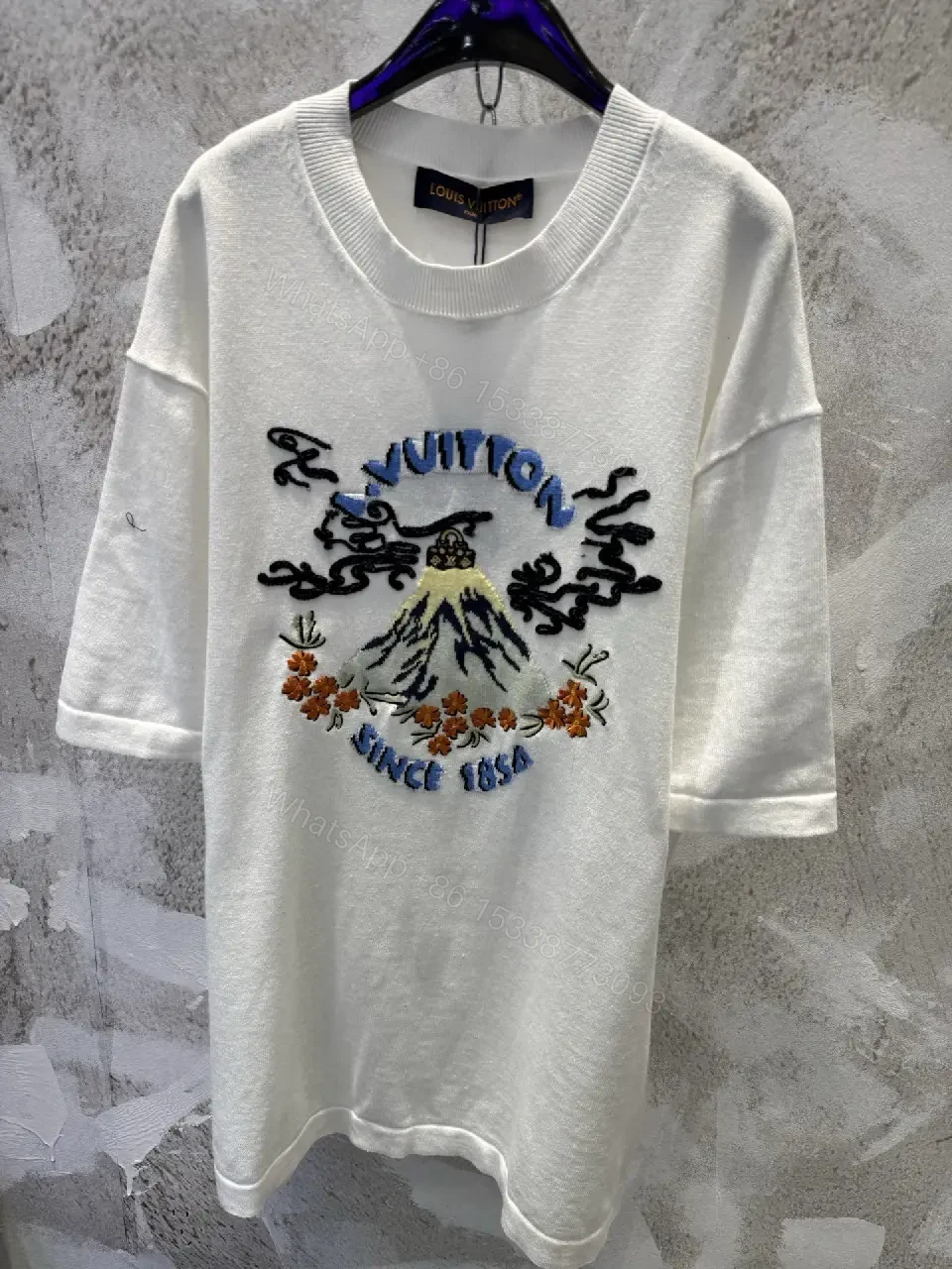 View 5 of White Embroidered Graphic Tee with Luxe Motif - Casual Luxury Top