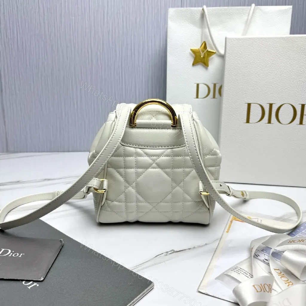 View 7 of Quilted White Mini Backpack with Gold Hardware - Compact Luxury