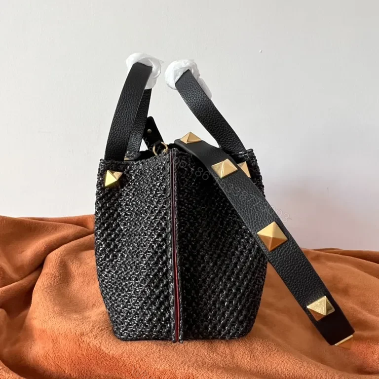 View 3 of Black Woven Luxe Handbag: Compact, Gold-Accent Style Bag