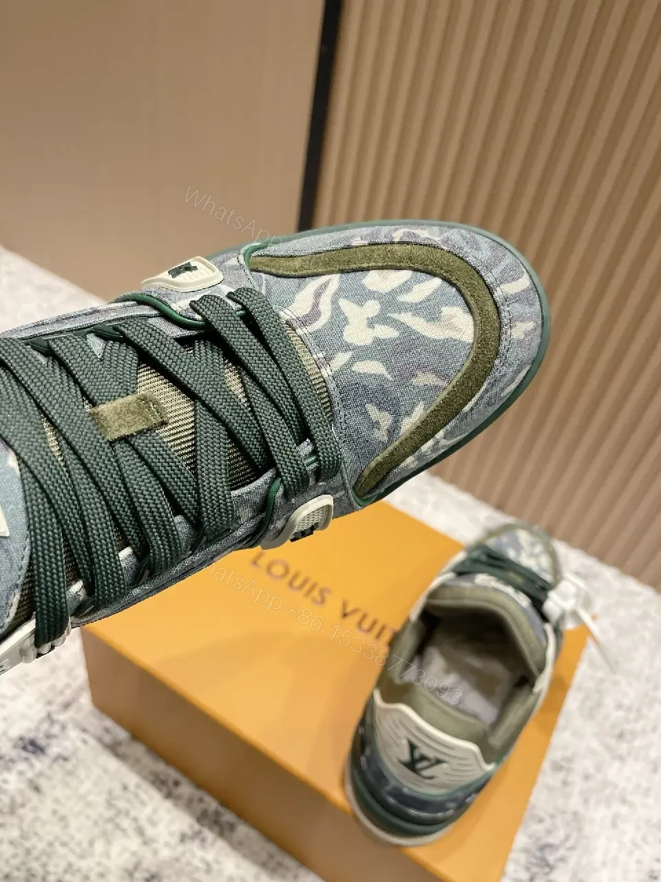 View 4 of Denim Textured Sneaker with LV Detailing, Modern Couture Outdoors