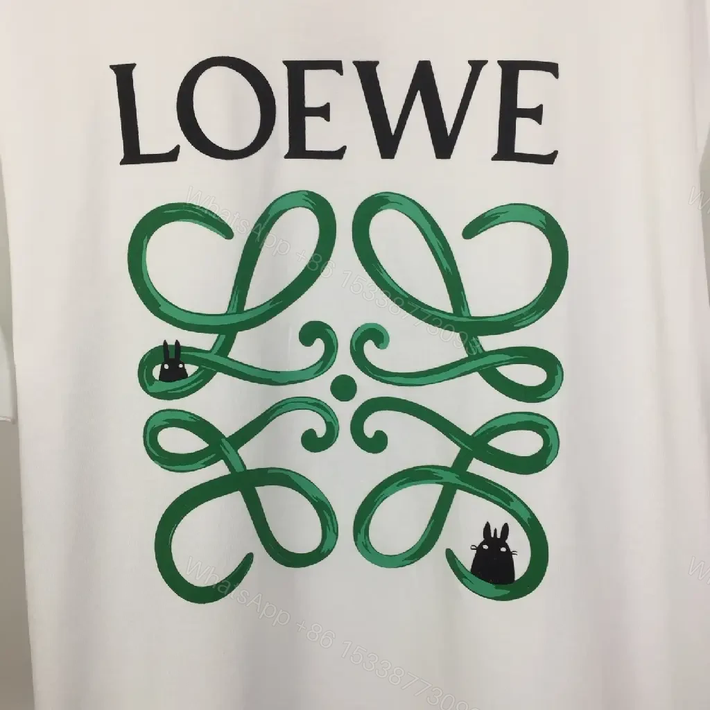 View 4 of White Cotton Graphic Tee – Opulent Comfort, Bold Logo, Casual Luxury