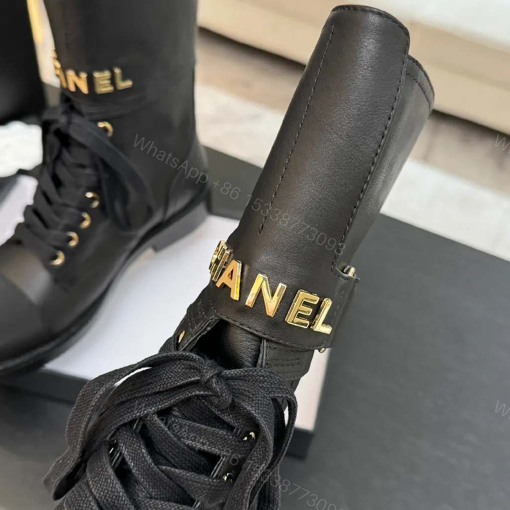 View 2 of Chic Black Combat Boots with Gold Detailing - High-Top Style