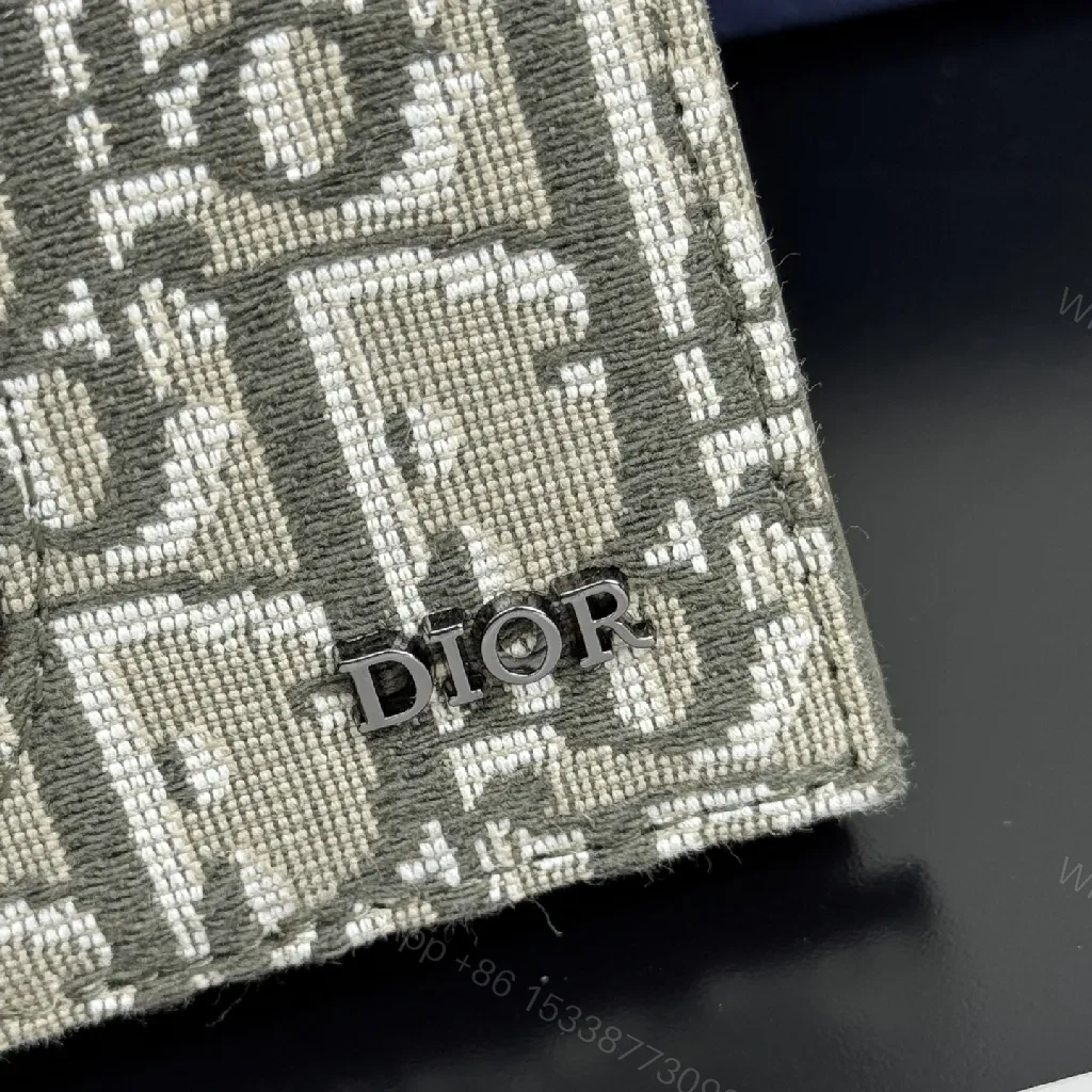View 2 of Monogram Knit Pebble Leather Chic Wallet: Compact, Luxe