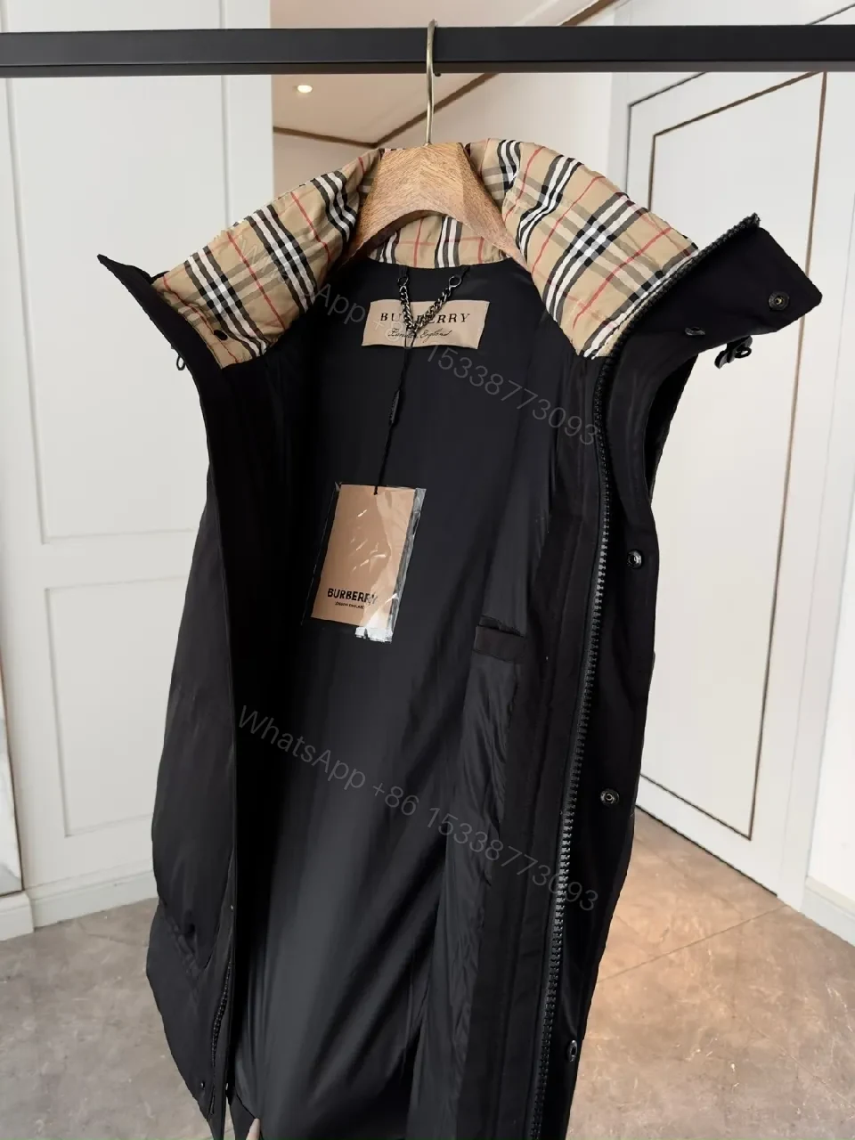 View 8 of Bold Puffer Vest with Plaid Lining — Structured Warmth, Modern Utility
