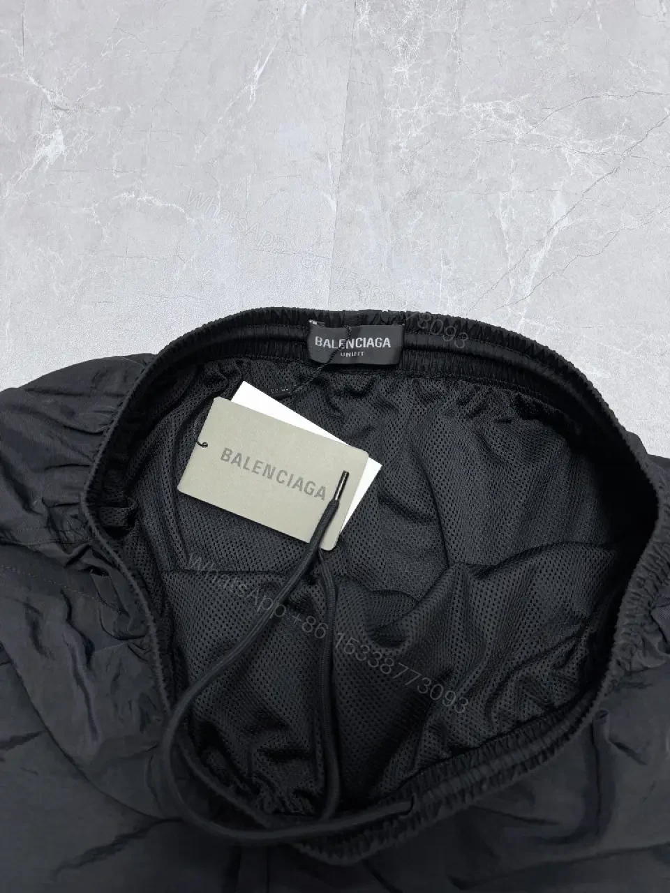 View 7 of Black Nylon Tech Shorts Lightweight Balenciaga Drawstring Closure Short Pants
