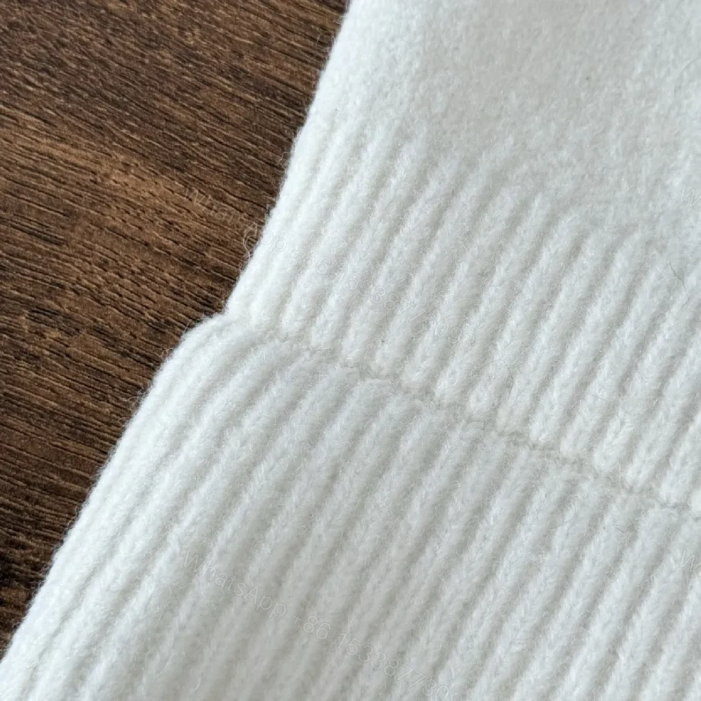 View 9 of Chic Minimalism Beanie: Off-White Knit, Embroidered Logo, Everyday Luxury