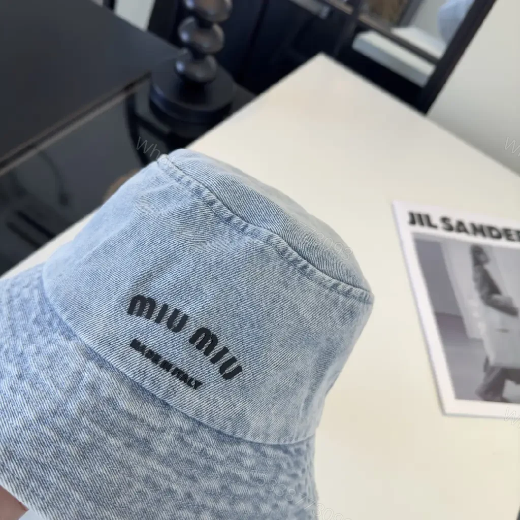 View 6 of Denim Bucket Hat - Lightweight, Subtle Logo, Stylish Everydaywear