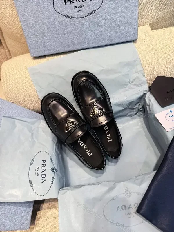 Black Leather Prada Slippers with Logo Trim — view 1