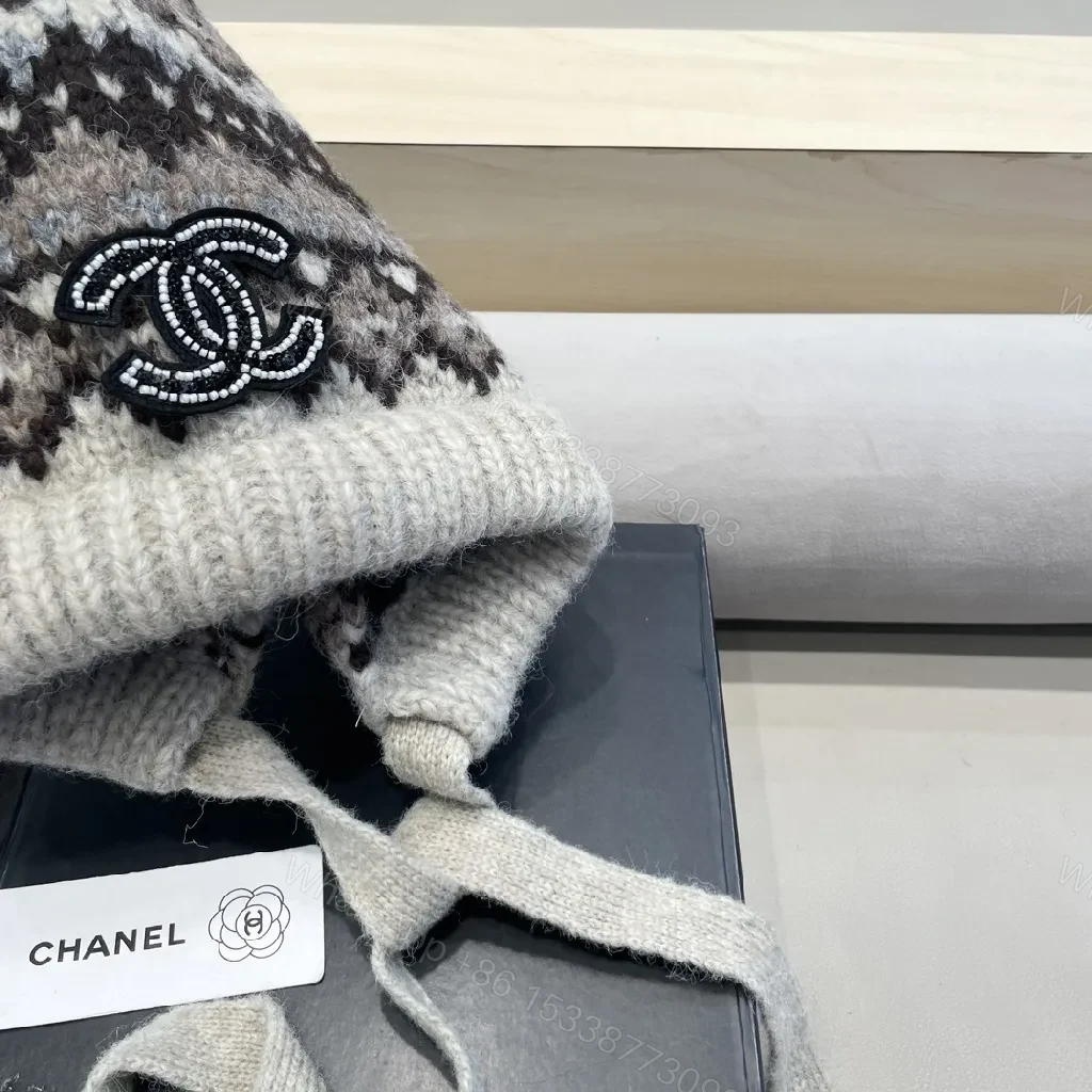 View 7 of Marled Knit Hat with Logo & Ear Flap Detail – Cozy Luxe