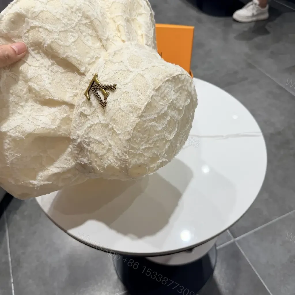 View 7 of Cream Lace Bucket Hat with Gold Accent Emblem, Ivory Crown Hat