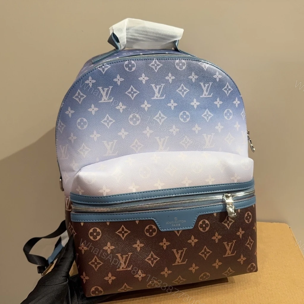 View 2 of Louis Vuitton Discovery Backpack PM Monogram Pigment Blue 38cm M28025