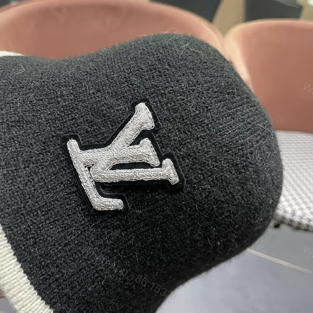 View 3 of Compact Luxury Knit Hat with Subtle LV-Inspired Emblem