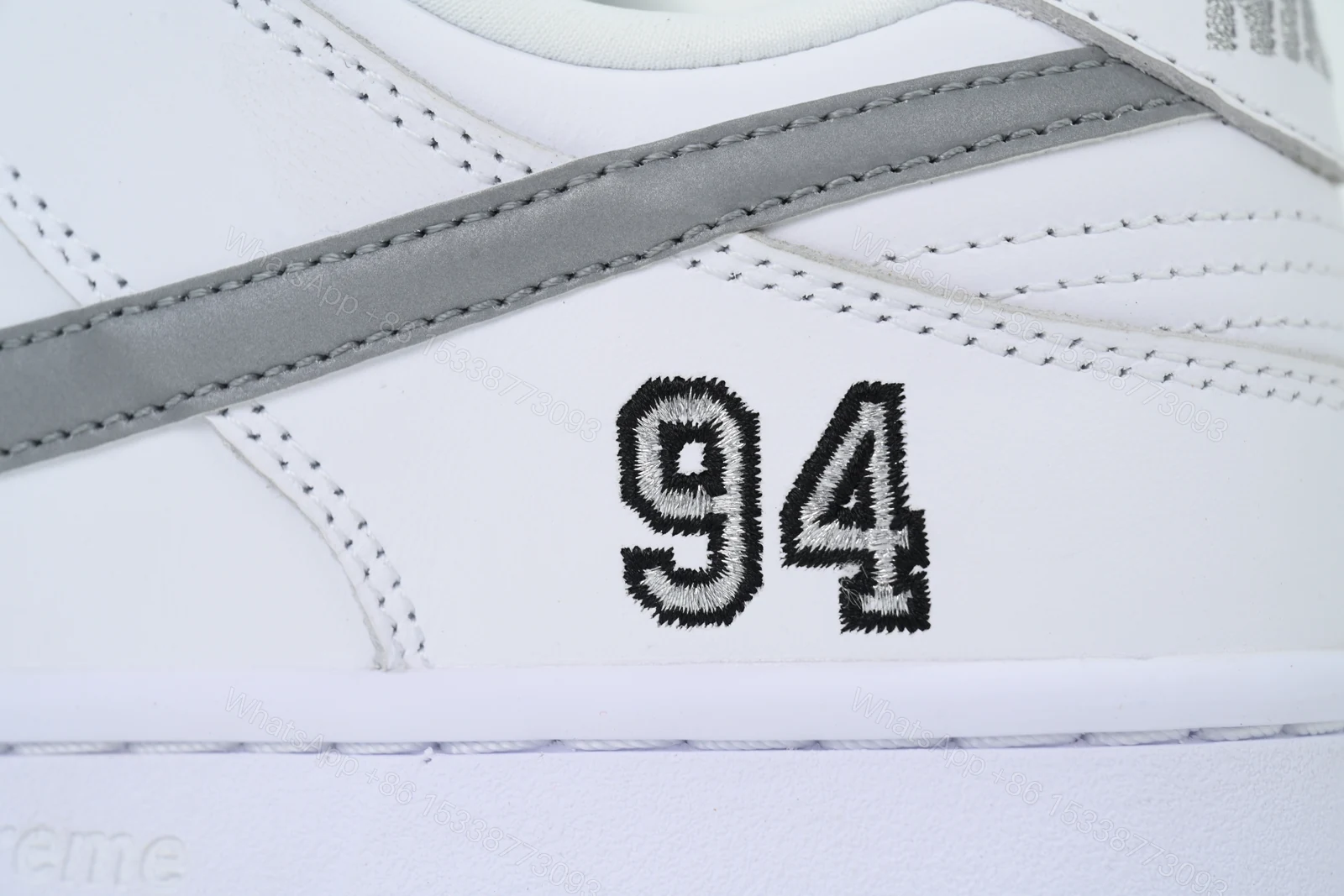 View 3 of Nike Supreme x Dunk Low SB 'White Metallic Silver' HQ8487-100