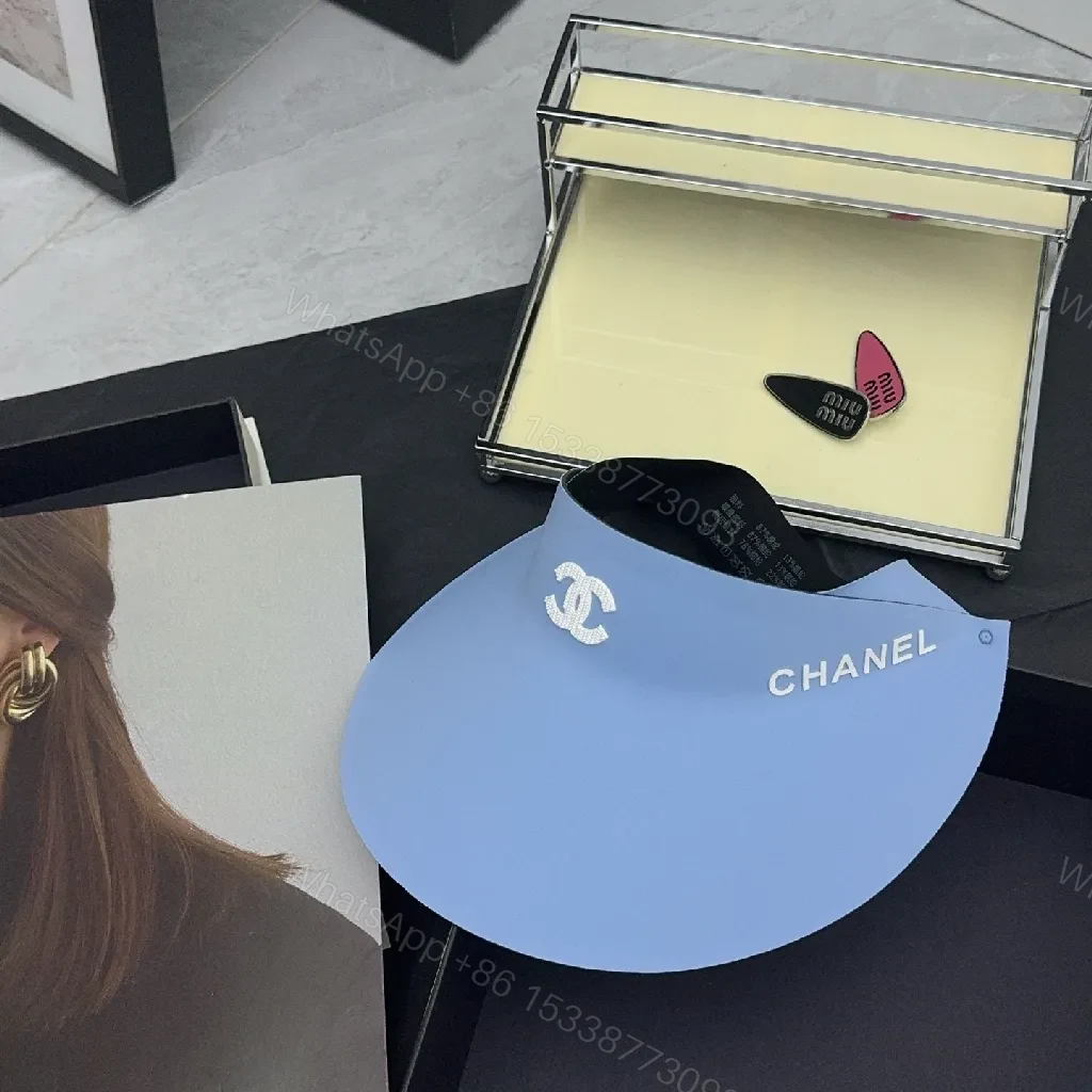 View 2 of Bold Visor Cap: Signature Chanel Accent, All-Season Comfort