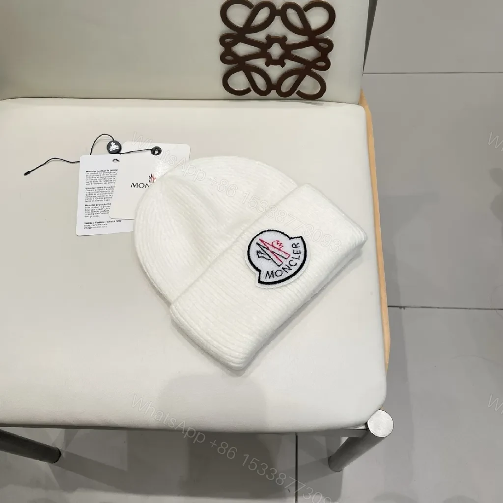 View 3 of White Knit Beanie: Ribbed Luxury, Crest Patch, All-Season