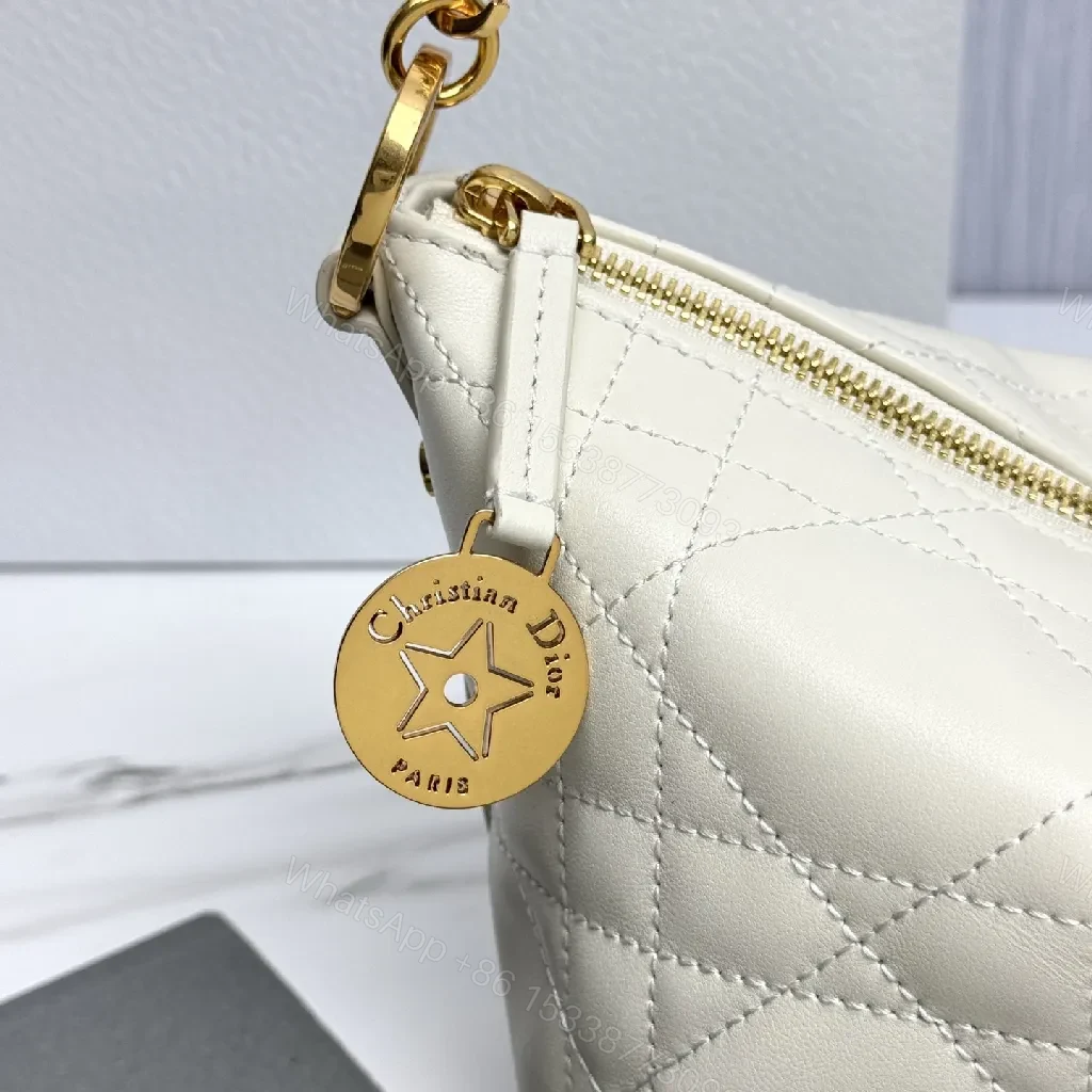 View 2 of Textured Quilted Mini Bag: White, Gold Chain, Star Charm