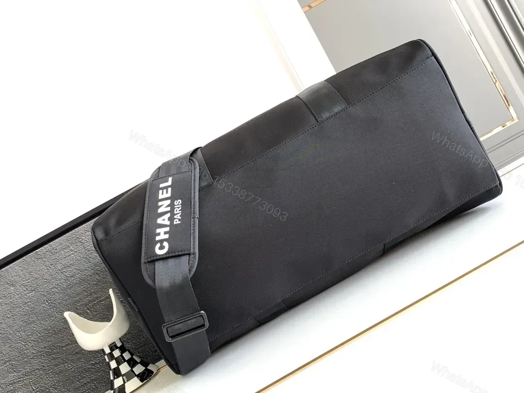 View 5 of Structured Black Travel Bag: Matte, Signature Emblem, All-Day Ready