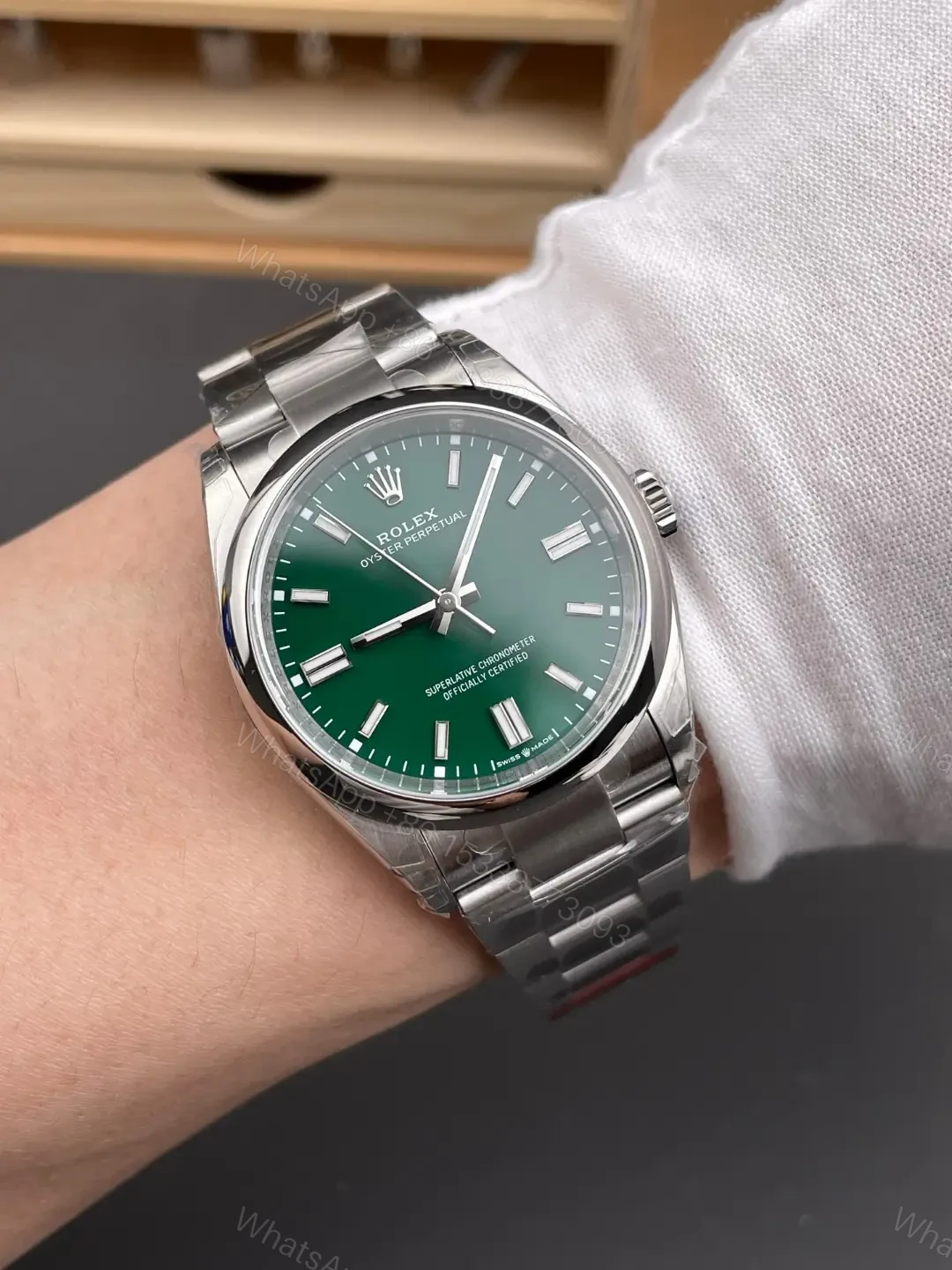 View 9 of Rolex Oyster Perpetual 36 126000 Green Dial Watch 126000-0005
