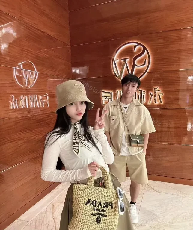 View 7 of Chic Buckle-Textured Pink Palette Bucket Hat - Prada Logo