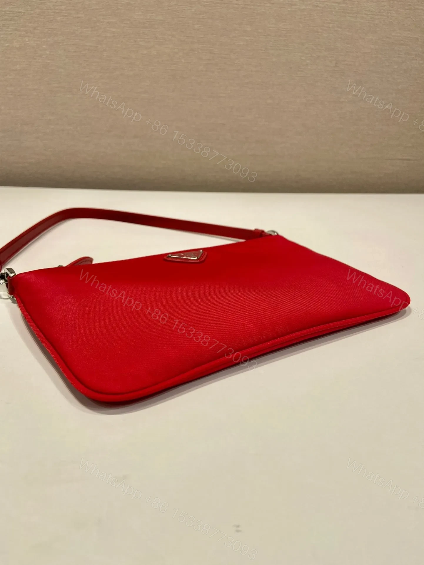 View 3 of SHOULDER BAG 24 WITH TRIANGLE LOGO IN PASSION RED RE-NYLON FABRIC