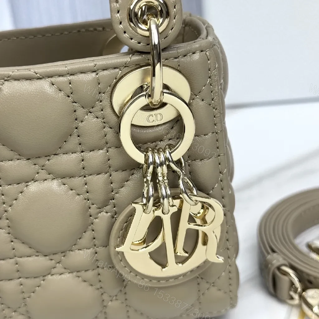 View 2 of Compact Quilted Satchel: Modern Texture, Iconic Details